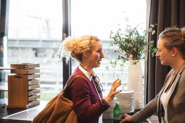 Attendees connecting over coffee at Temedica’s “The Future of Health Insights” 2024 event, fostering dialogue and collaboration in healthcare innovation